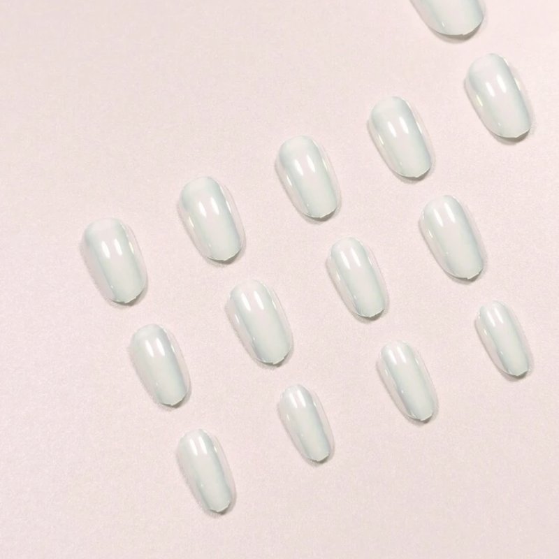 Chrome White press-on nails with a glossy, metallic finish.
