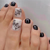 Black and white press-on toenails with delicate wrapped leaf design – Inkwrapped pedicure set by Impress Me